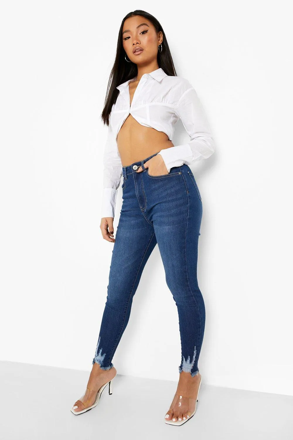 Petite Distressed High Rise Skinny Jeans