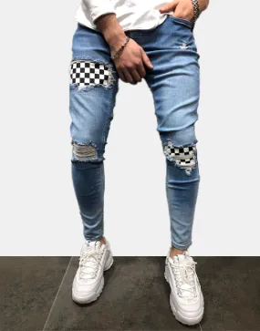 xChequered Distressed Skinny Jeans